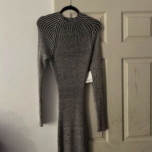 Long sleeve sweater dress with a back cutout and split in the back